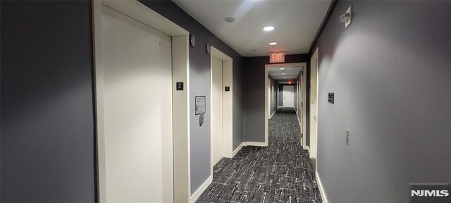 800 12th St Unit 207, Palisades Park, NJ 07650 - corridor featuring baseboards, recessed lighting, and elevator