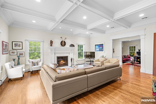 6 Lauren Pond Ct, Demarest, NJ 07627 - living area with a glass covered fireplace, plenty of natural light, light wood-style flooring, beamed ceiling, and coffered ceiling