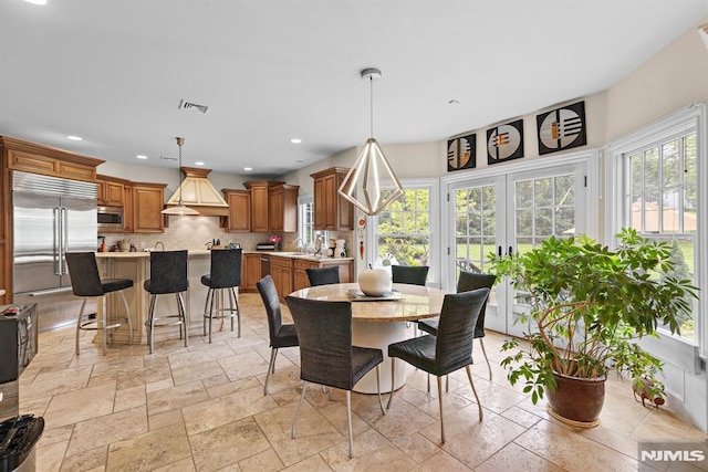 6 Lauren Pond Ct, Demarest, NJ 07627 - dining space featuring stone tile floors, recessed lighting, and french doors