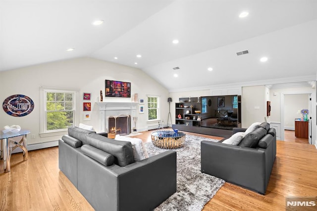6 Lauren Pond Ct, Demarest, NJ 07627 - living area with vaulted ceiling, a fireplace with flush hearth, plenty of natural light, light wood-style flooring, and recessed lighting
