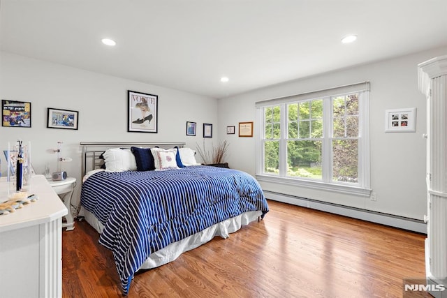 6 Lauren Pond Ct, Demarest, NJ 07627 - bedroom with baseboard heating, wood finished floors, and recessed lighting
