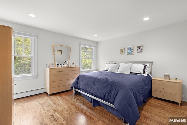 6 Lauren Pond Ct, Demarest, NJ 07627 - bedroom with baseboard heating, multiple windows, recessed lighting, and wood finished floors