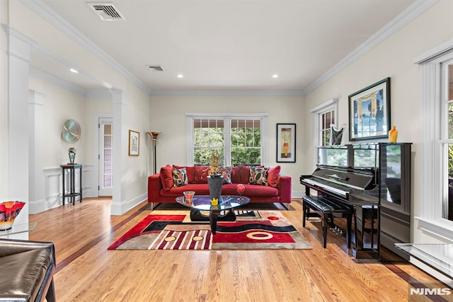 6 Lauren Pond Ct, Demarest, NJ 07627 - living area with wood finished floors, crown molding, baseboards, recessed lighting, and decorative columns
