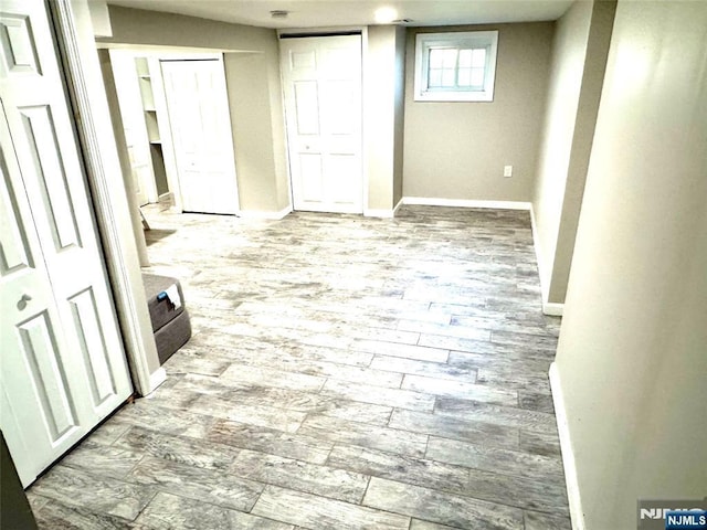 194 Elm Ave, Teaneck, NJ 07666 - basement featuring wood finished floors and baseboards