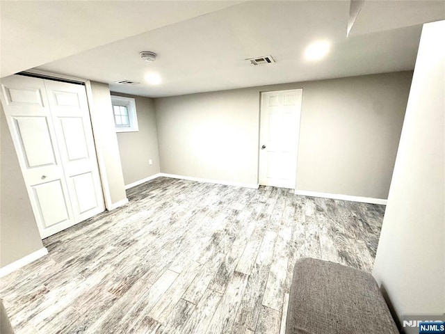194 Elm Ave, Teaneck, NJ 07666 - basement with wood finished floors and baseboards