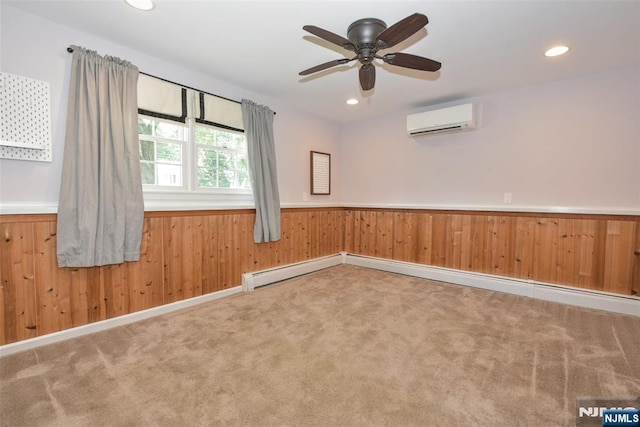 126 Darrow Dr, North Haledon, NJ 07508 - spare room featuring a wall mounted air conditioner, carpet floors, a wainscoted wall, a ceiling fan, and recessed lighting