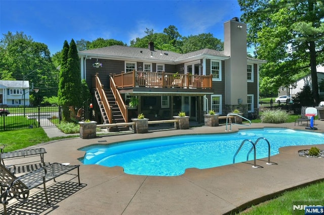 126 Darrow Dr, North Haledon, NJ 07508 - view of swimming pool with a patio, stairway, and a deck