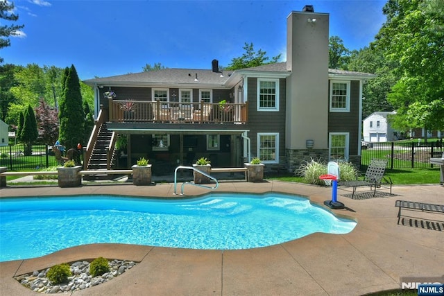 126 Darrow Dr, North Haledon, NJ 07508 - view of swimming pool featuring a patio area, stairway, and a wooden deck