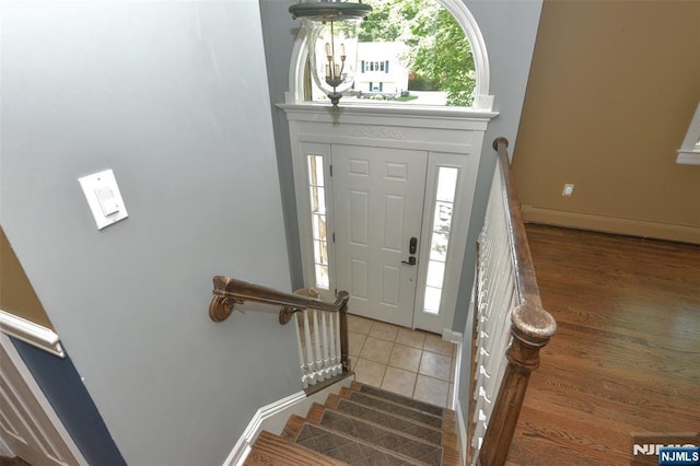 126 Darrow Dr, North Haledon, NJ 07508 - tiled entryway featuring stairs and baseboards