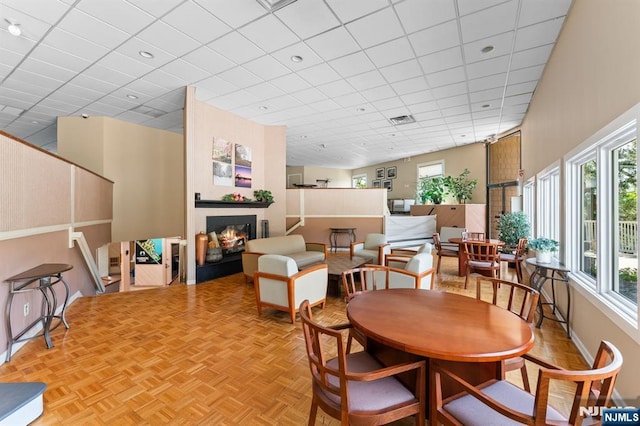 506 Teal Plz, Secaucus, NJ 07094 - dining space featuring a glass covered fireplace and stairway