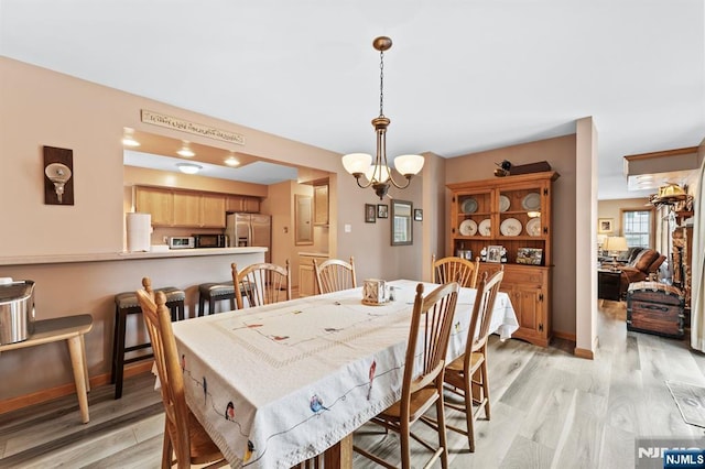 41 Sycamore Ave, Hillsdale, NJ 07642 - dining area featuring light wood-style flooring and baseboards