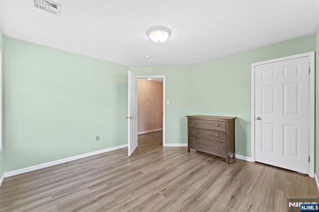41 Sycamore Ave, Hillsdale, NJ 07642 - unfurnished bedroom featuring wood finished floors and baseboards