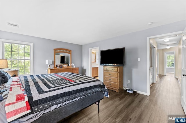 41 Sycamore Ave, Hillsdale, NJ 07642 - bedroom featuring wood finished floors, multiple windows, and baseboards