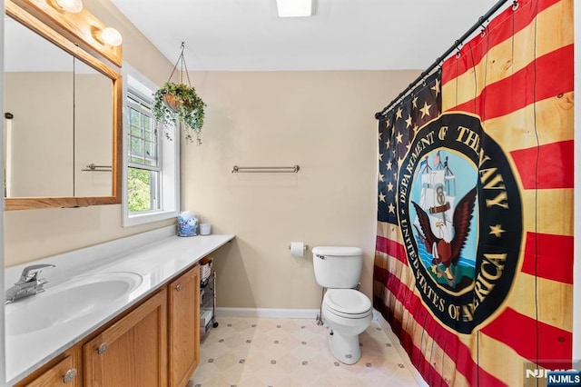 41 Sycamore Ave, Hillsdale, NJ 07642 - full bath featuring vanity, toilet, baseboards, tile patterned floors, and a shower with curtain