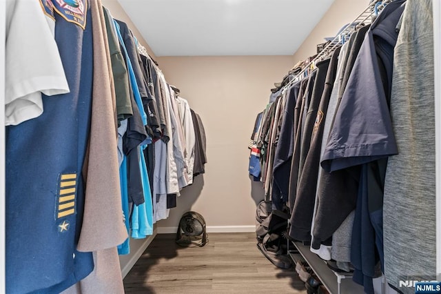 41 Sycamore Ave, Hillsdale, NJ 07642 - walk in closet featuring wood finished floors