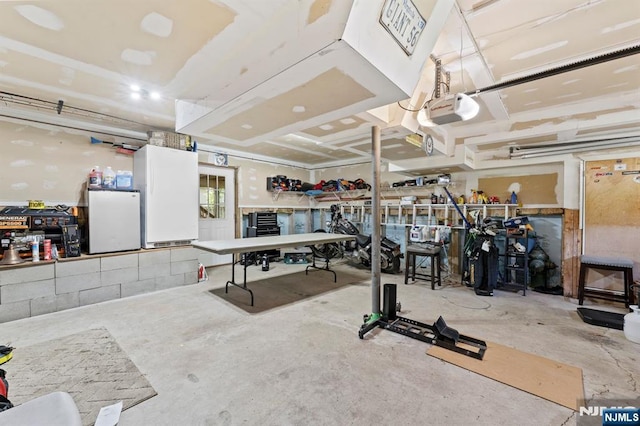 41 Sycamore Ave, Hillsdale, NJ 07642 - exercise room featuring a workshop area and a garage