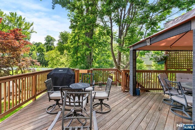 41 Sycamore Ave, Hillsdale, NJ 07642 - deck with outdoor dining area and area for grilling