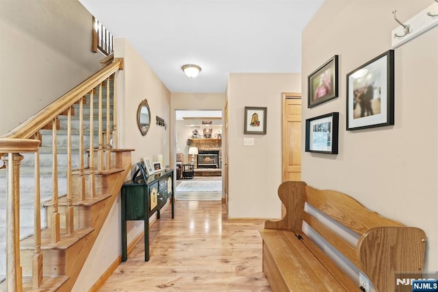 41 Sycamore Ave, Hillsdale, NJ 07642 - hallway featuring light wood-style flooring and stairs