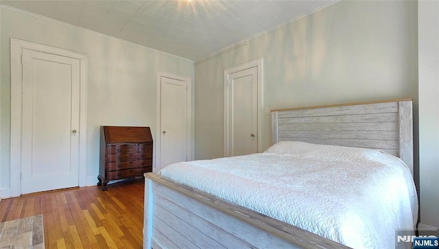 275 Engle St Unit G4, Englewood, NJ 07631 - bedroom featuring crown molding and hardwood / wood-style floors