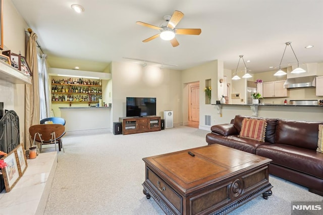 45 Dykers Farm Rd, North Haledon, NJ 07508 - carpeted living area with a ceiling fan, recessed lighting, and a bar