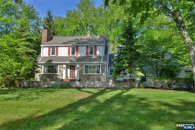 76 Spring Valley Rd, Montvale, NJ 07645 - view of front of house featuring a front lawn and stone siding