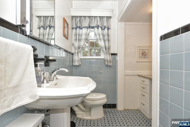 76 Spring Valley Rd, Montvale, NJ 07645 - half bathroom featuring tile walls and toilet