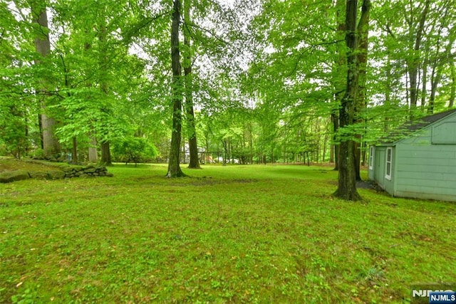 76 Spring Valley Rd, Montvale, NJ 07645 - view of green lawn with an outdoor structure