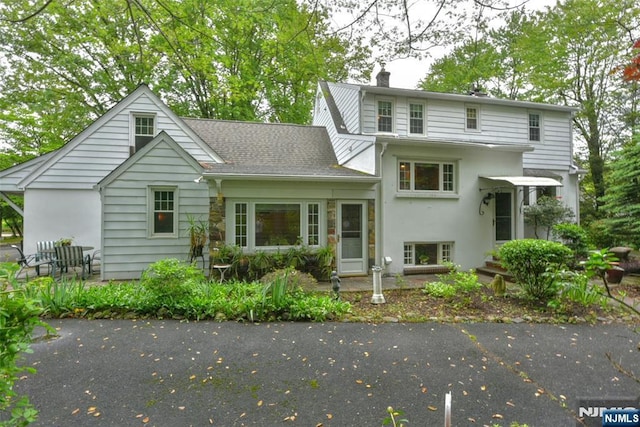 76 Spring Valley Rd, Montvale, NJ 07645 - view of front of property featuring a chimney and stucco siding