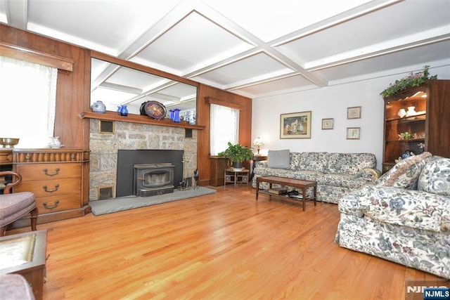 76 Spring Valley Rd, Montvale, NJ 07645 - living room featuring coffered ceiling, wood finished floors, beam ceiling, and a wood stove