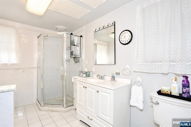 328-330 Hoover Ave, Bloomfield, NJ 07003 - bathroom featuring a stall shower, vanity, and tile patterned floors
