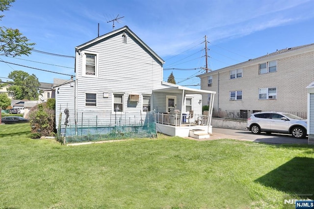 328-330 Hoover Ave, Bloomfield, NJ 07003 - back of property featuring a lawn and a porch