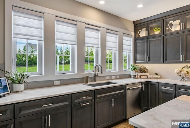 15 Meadowbrook Rd, Upper Saddle River, NJ 07458 - kitchen featuring a sink, dishwasher, light stone countertops, recessed lighting, and glass insert cabinets