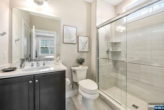 15 Meadowbrook Rd, Upper Saddle River, NJ 07458 - ensuite bathroom featuring vanity, toilet, a stall shower, and baseboards
