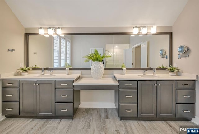 15 Meadowbrook Rd, Upper Saddle River, NJ 07458 - full bath featuring two vanities and wood finished floors
