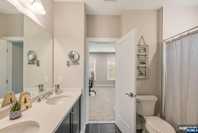 15 Meadowbrook Rd, Upper Saddle River, NJ 07458 - bathroom with double vanity, toilet, and a shower with shower curtain