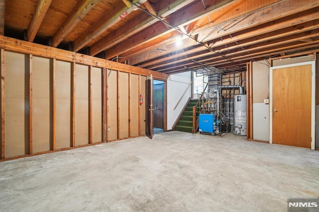 526 Cleveland Ave, River Vale, NJ 07675 - unfinished basement with gas water heater, stairs, and a heating unit