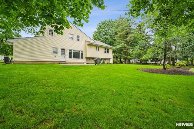 526 Cleveland Ave, River Vale, NJ 07675 - back of house with central AC and a yard