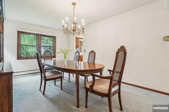 526 Cleveland Ave, River Vale, NJ 07675 - carpeted dining space featuring a chandelier, baseboard heating, and baseboards