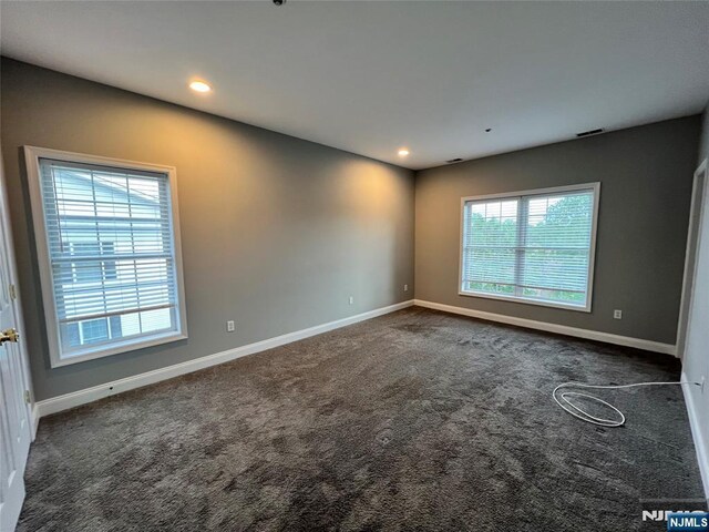 107 Hawthorne Ave Unit D, Park Ridge, NJ 07656 - carpeted empty room with baseboards and recessed lighting