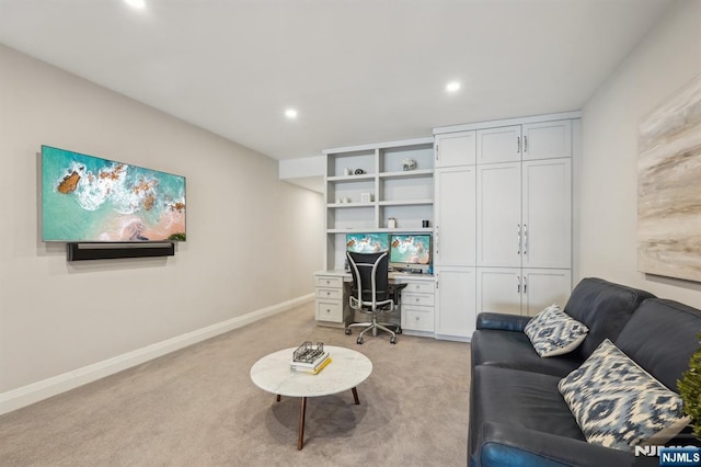 1360 Hamburg Tpke Unit 702, Wayne, NJ 07470 - home office featuring light carpet, recessed lighting, baseboards, and built in desk