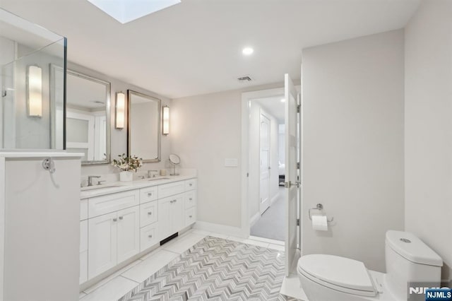 1360 Hamburg Tpke Unit 702, Wayne, NJ 07470 - full bath featuring toilet, double vanity, recessed lighting, tile patterned floors, and baseboards