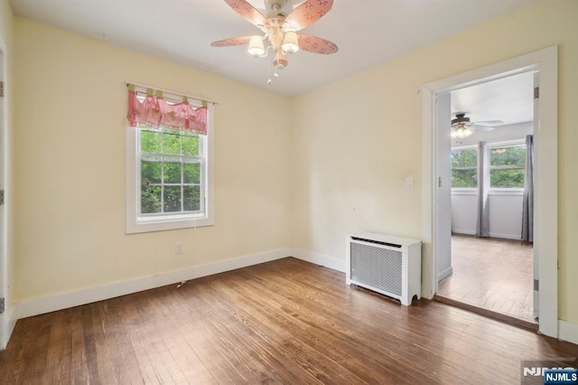 21 Albert Ave, Fair Lawn, NJ 07410 - unfurnished room with ceiling fan, radiator heating unit, wood-type flooring, and baseboards