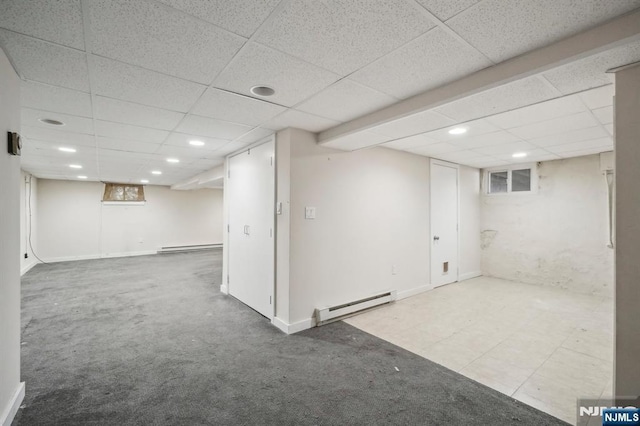 21 Albert Ave, Fair Lawn, NJ 07410 - basement with a baseboard heating unit, a drop ceiling, recessed lighting, a baseboard radiator, and carpet floors