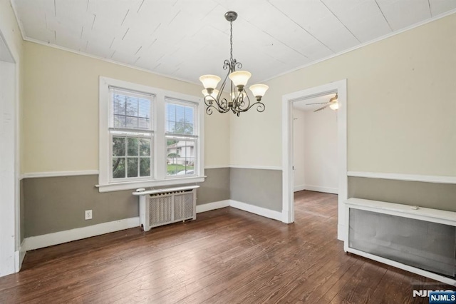 21 Albert Ave, Fair Lawn, NJ 07410 - unfurnished dining area with radiator, crown molding, a chandelier, hardwood / wood-style floors, and baseboards