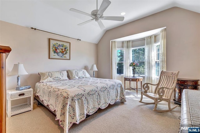  - bedroom featuring lofted ceiling, carpet flooring, and ceiling fan