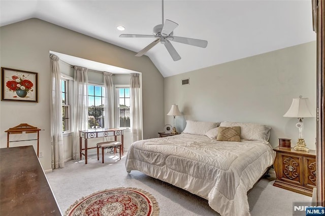  - bedroom featuring vaulted ceiling, carpet, and a ceiling fan