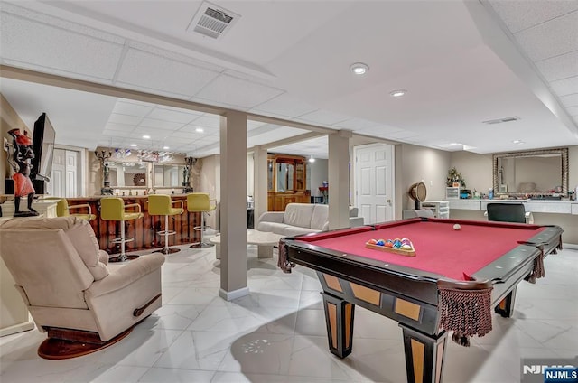  - game room with bar, billiards table, light marble finish floors, and recessed lighting