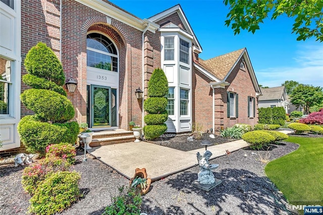  - view of front facade featuring brick siding