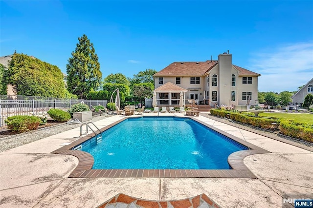  - view of pool featuring a patio
