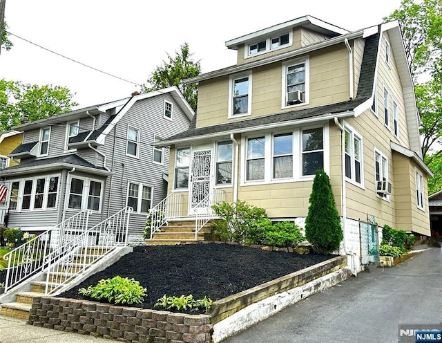 128 Oak Ridge Ave, Nutley, NJ 07110 - traditional style home featuring cooling unit and stairway